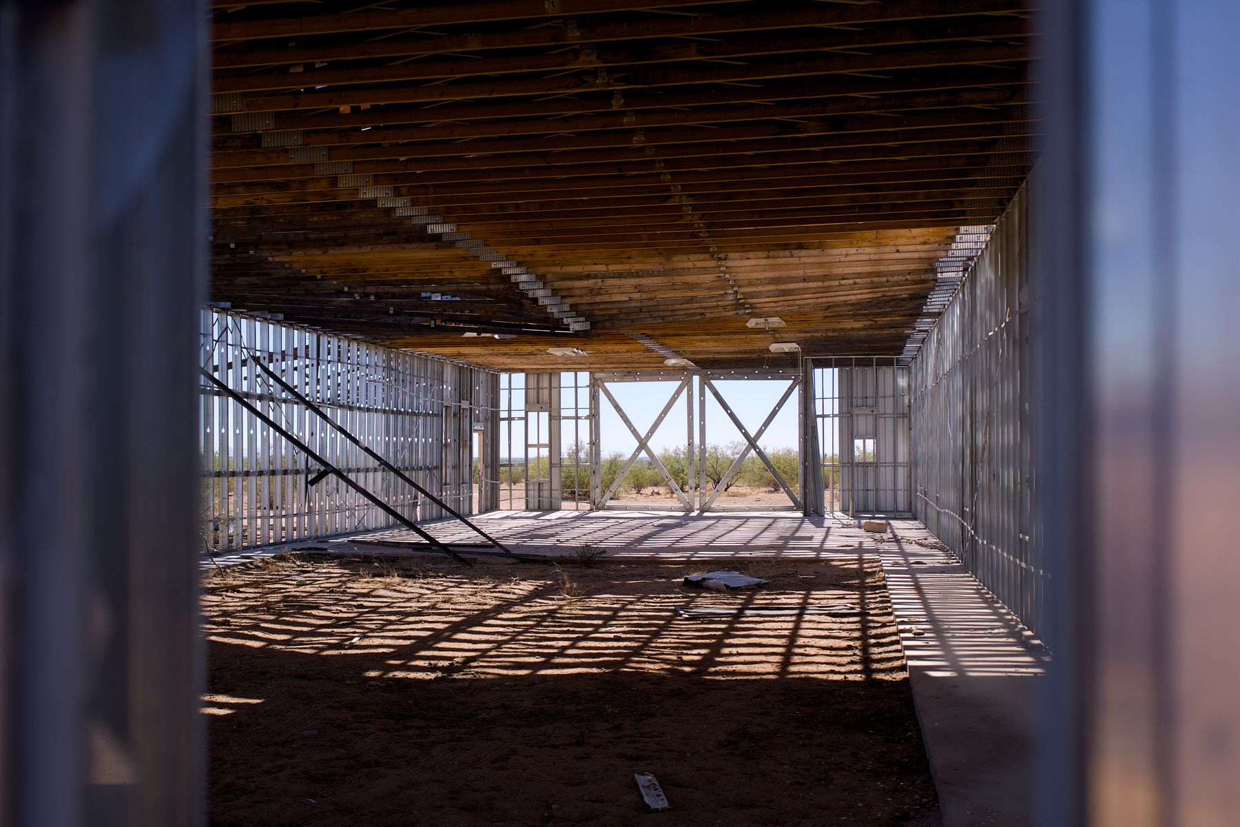 Commercial interior with metal stud framing under construction, reference photo
